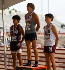 Holliday's Noah Strohman receives his first gold medal at the 2024 UIL State Track & Field Meet