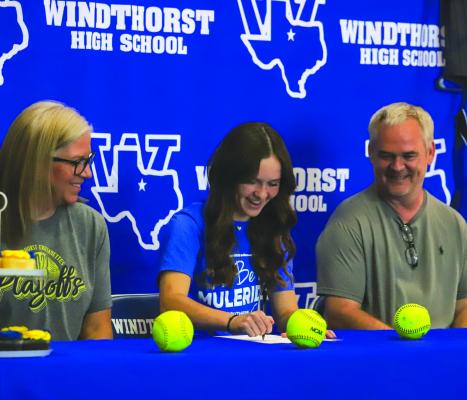 Recent Windthorst graduate Bree Kirk signed her Letter of Intent to continue her softball career at Southern Arkansas University in a signing ceremony on Wednesday, Aug. 2. Photo/Will Edwards