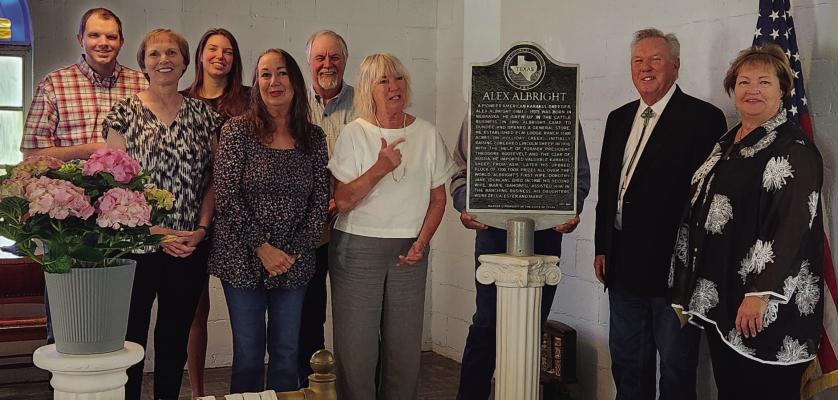 Descendants of Alex Albright pose for a photo with his historical state marker at its rededication ceremony on Sunday, May 3. Courtesy photo/Katie Mitchell