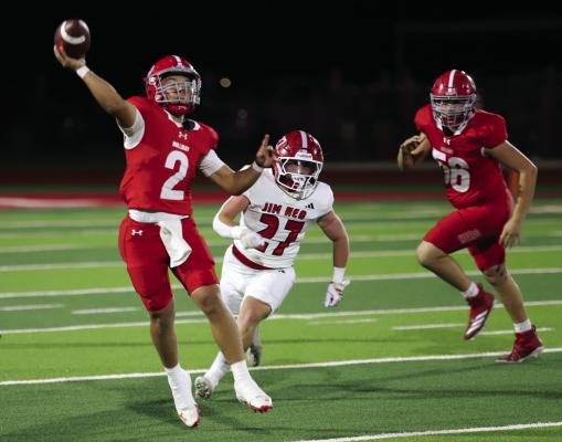 Holliday quarterback Caleb McClane throws to a receiver in the Eagles’ Homecoming game against versus Jim Ned on Friday, Sept. 26. Photo/Landon Davis