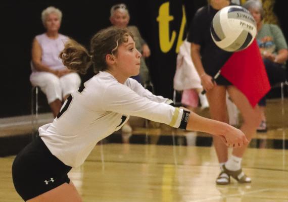 Archer City’s Rebecca Taggart makes a pass in the Lady Cats’ 3-2 loss to Quanah on Saturday, Sept. 24.. Photo/Jenny Schroeder