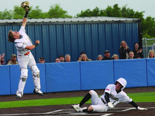 Archer City Senior Parker Hilbers slides in for the Wildcats second run of Game 2 as Nocona Catcher Kutter Cabrera rises for the ball during the Wildcats 7-3 loss to the Indians at City View High School. Photo/Nathan Lawson
