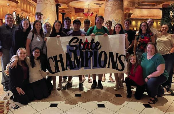 The Holiday High School Academic Team show off their 3A UIL State Academic champion banner after claiming the overall sweepstakes with 124.5 points. Courtesy photo