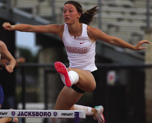 Lady Eagle Taylor Gee advanced to regionals after she finished second in the 300-meter hurdles at the area meet on Thursday. Photo/Landon Davis