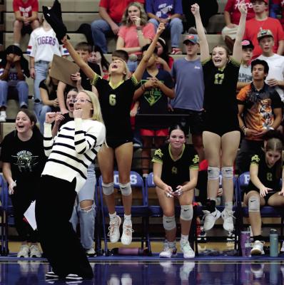 Archer City's head coach Krissa England celebrates following the Lady Cats area round win over Hico in 2025. File photo