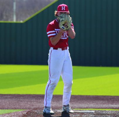 Holliday’s Caleb White eyes an Iowa Park hitter in the Eagles’ 2-1 win over the Hawks on Tuesday, March 11. White finished the day with eight strikeouts and allowed just two hits. Photo/Landon Davis