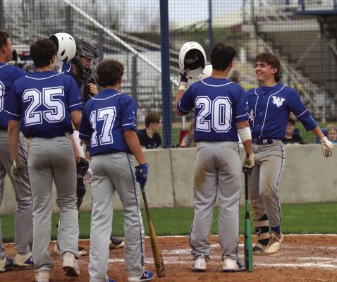 Windthorst’s Zeke Mayo celebrates at home plate after belting a grand slam in the Trojans 26–2 win over Archer City on Tuesday, April 4. Photo/Will Edwards