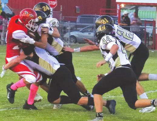 The Archer City defense swarmed Electra all night, allowing only three first downs in a 42-0 win over the Tigers on Friday, Oct. 9. Photo/Will Edwards