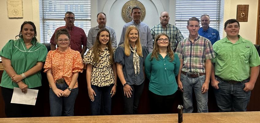 Archer County 4-H spoke to the Commissioner's Court about Volunteer Week on Monday, April 27. Pictured L-R: Back Row: Todd Herring, Kendall Coleman, Randy Jackson, Darin Wolf, Wade Scarbrough. Front Row: Kortney Kulhanek, Leah Conrad, Briella Humpert, Ella Dora, Taylor Conrad, Whit Parkey, Brantley Humpert. Courtesy photo