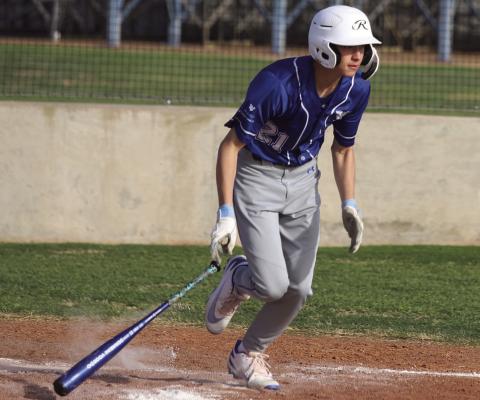 Windthorst secondbaseman Gram Finley takes off for first base after knocking a single into right field against Electra on Monday, March 17. Photo/Nathan Lawson