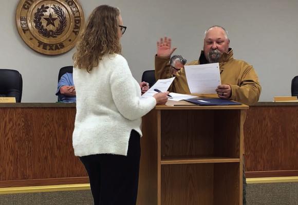 City Secretary Gerri Ayers McDonald swears in new Counciman Place 4 Scott Hammel during the Holliday City Council meeting on Monday, March 13. File photo
