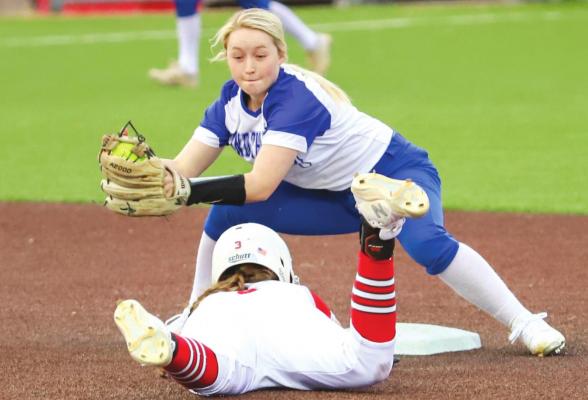 Windthorst’s Camryn Latham gets the tag down on Holliday’s Evelyn Perkins on an attempt to steal second in the Lady Eagles’ 12-2 win over Windthorst at D-BAT Field. Photo/Will Edwards
