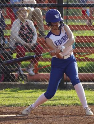 Windthorst’s Keaira Fillingim connects with a go-ahead single up the middle in the Trojanettes 21-15 come-from-behind win over Petrolia on Tues., April 11 Photo/Will Edwards