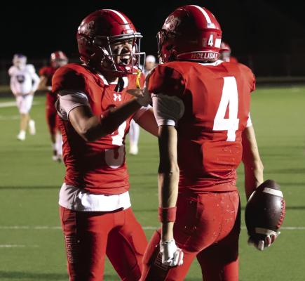 Holliday's Ty Harrison (3) hypes up Jayden Whitley (4) following Whitley's touchdown catch in the Eagles 50-36 win over Early on Friday, Nov. 14. Photo/Nathan Lawson