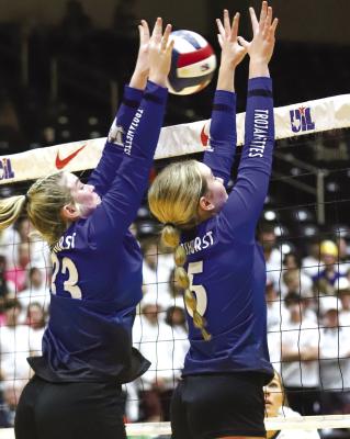 Windthorst’s Tara Tackett broke the Class 2A state tournament record with nine blocks in the Trojanettes state championship match win over Lindsay on Friday, Nov. 18, in Garland. Photo/Will Edwards