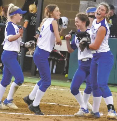 The Windthorst Trojanettes celebrate following a game one win over Rio Vista in the regional quarterfinals on Thursday, May 13, at Denton Ryan. Photo/Will Edwards