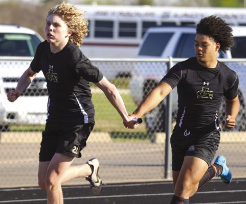 Archer City’s sprint relay team of Jre Donnell (Right), Kellar Crow (Left), McKinnen Beaver and Laine Hall (not pictured) blew away the competition, posting the district’s top time at 45.17 at the District 9-2A meet on Thurs., April 6, in Petrolia. Photo/Will Edwards