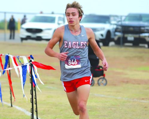Holliday’s Noah Strohman dominated the boys district competition, finishing a full minute faster than second place, posting a time of 15:30.15 to lead the Eagles to double gold medals. Photo/Will Edwards