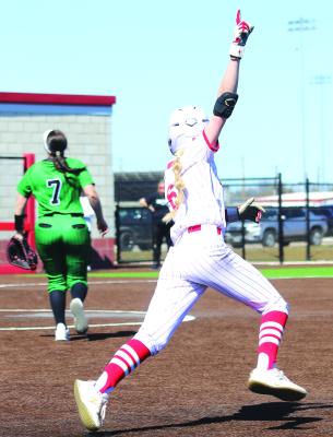 Sophomore outfielder Sammi Kirkland celebrates as she rounds first base after her walk-off double against Iowa Park on Monday, March 10. Photo/Landon Davis