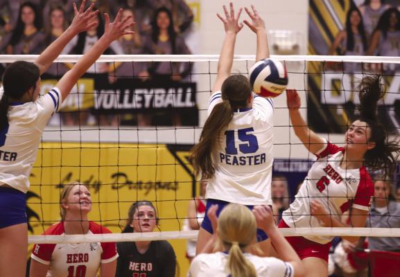 Holliday's Kenna Wood hammered home four kills in the decisive fifth set to lift the Lady Eagles to a 3-2 win over Peaster and a berth in the regional tournament on Tuesday, Nov. 8, in Chico. Photo/Jerry Phillips