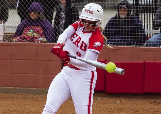 Holliday’s Sydney Linn barrels up a hit in the Lady Eagles’ 10-2 win over Henrietta on Weds., March 15. Photo/Will Edwards