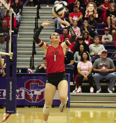 Setter Maggie Maxwell puts up a set in Holliday’s 3-1 Regional Finals round loss to Tolar in Graham on Saturday, Nov. 16.