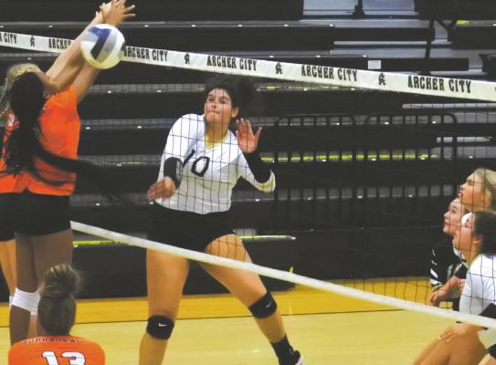Junior Bailey Grant puts down a kill in the first set of the Lady Cats’ 3-1 win over Burkburnett on Friday, Sept. 18. Photo/Will Edwards