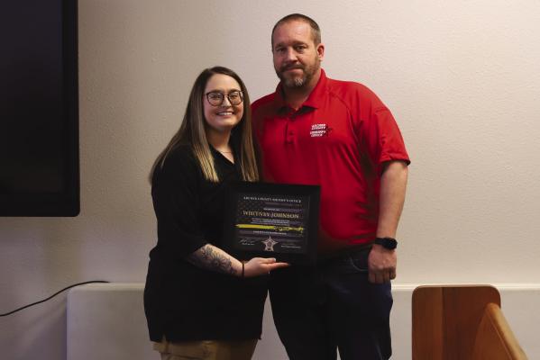 Dispatcher Whitney Johnson was presented with the Sheriff's Life Sacving Award by Sheriff Jack Curd on Monday, Feb. 27. Photo/Nathan Lawson