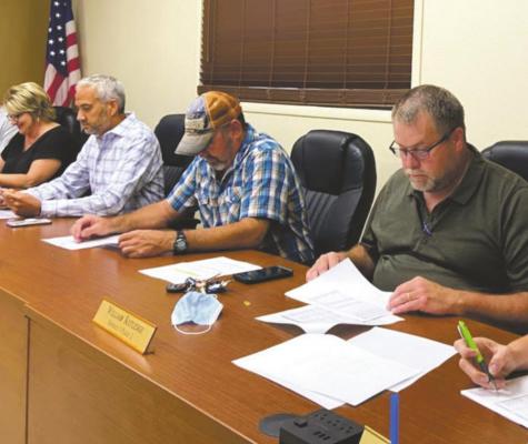 The Lakeside City Council reviews documents during a Sept. 8 council meeting. The council reviewed bids for tank inspections during its Sept. 15 council meeting. Courtesy photo/Eric Stephens