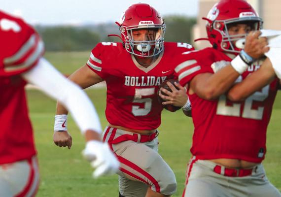 Holliday senior Jaxx Johnson looks for running room in the first half of the Eagles 37-7 romp of Idalou on Friday, Sept. 9. Johnson finished with a game-high 144 yards on 11 carries in the win. Photo/Will Edwards