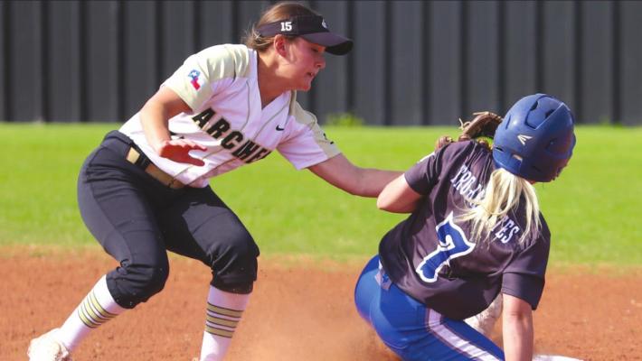 Archer City’s Aspyn Huseman makes the tag on Windthorst’s Camryn Latham in the Lady Cats 12-2 win over the Trojanettes on Monday, April 18. Photo/Will Edwards