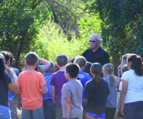 Windthorst fourth graders listen to ACMAC Board Member Brad Mitchell give a history of Stonewall Jackson Camp and the Comanche Tree Marker on Wednesday, Oct. 1 File photo