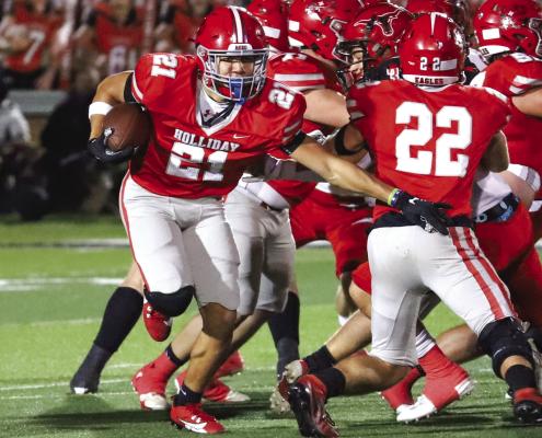 Tyrese Polite picks his way through the hole during Holliday's 44-7 win over Eastland on Friday, Nov. 10. Photo/Will Edwards