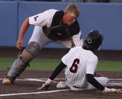 Archer City Senior Catcher Shooter Canada tags out Nocona's RJ Walker at home during Game 2 of the Wildcats Bi-District loss to the Indians. Photo/Nathan Lawson