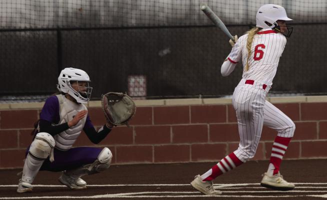 Centerfielder Sammi Kirkland goes a slap hit in Holliday’s 13-12 extra-inning win overJacksboro on Tuesday, Marxh 4. Photo/Landon Davis