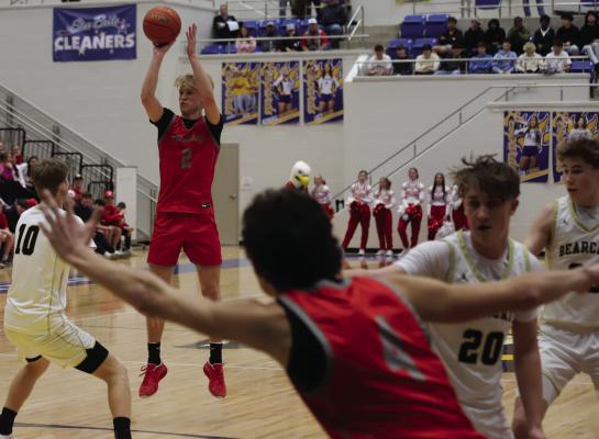 Senior Ashtyn Berry nails a crucial fourth-quarter three in Holliday’s playoff playin. Berry finished the night with 16 points and 14 rebounds. Photo/Landon Davis