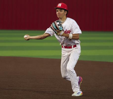 Holliday second baseman Kelson Wales tosses a ground ball to first base in the Eagles’ 5-0 win over Vernon on Friday, April 11. Photo/Landon Davis