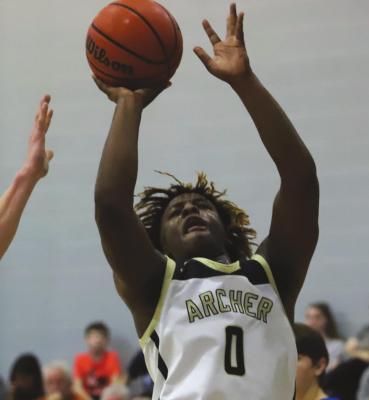 Archer City's Elijah Jackson earned all-tournament honors at the Windthorst Tournament after posting a pair of double-doubles in four games last week. Photo/Will Edwards