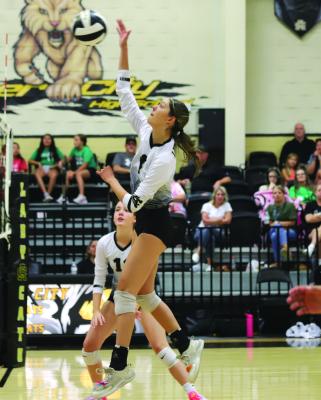 Archer City’s Malia Jones goes for the kill in their 15-11 fifth set victory over Newcastle. Photo/Landon Davis