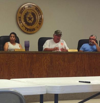 Holliday Councilwoman Sandra Morris (left), Mayor Allen Moore and Councilman Gary Bernal debate fireworks at its meeting Monday, June 14. Photo/Kelsey Cantrell