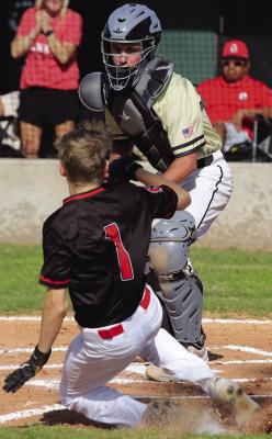 Wildcat catcher Reed Truette makes the tag at home after catching a picture-perfect throw from centerfielder Isaac Dieguez in Archer City’s district game versus Olney on Tuesday, April 8. Photo/Landon Davis