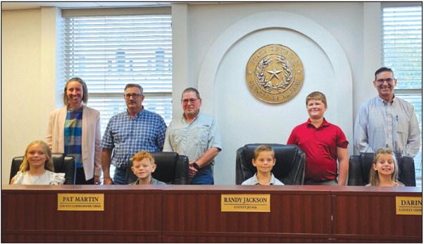 The Archer County Commissioner's Court proclaimed Oct. 1 through 7 as National 4-H Week in Archer County during its meeting on Monday, Sept. 25. Pictured are the Archer County Commissioners, Extension Agents and members of Archer County 4-H. Courtesy photo/Maranda Revell