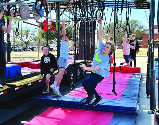 Archer City ISD had the group Ninja Anywhere bring its massive obstacle course for students to try on Friday, March 3. The field day was focused on building students' morale. Courtesy photo