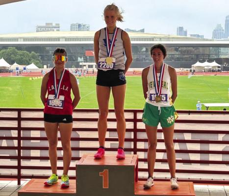 Windthorst’s Cameron Belcher won her first career gold medal, taking the top spot on the podium in the two mile with a time of 11:30.91 at the state track meet on Fri., May 12. Photo/Jerry Phillips