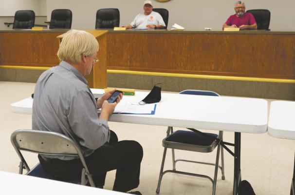 Holliday City Attorney James Rasmussen speaks to the Holliday City Council about the annexation of a property during the city's council meeting Monday, March 8.Photo/Ravyn Fager