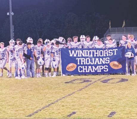 Trojans coast to victory in regular season finale