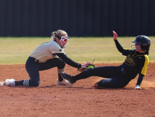 Archer City’s Emma Gray tags out a baserunner at second in the Lady Cats 17-0 win over Chico on Monday, March 14. Photo/Will Edwards