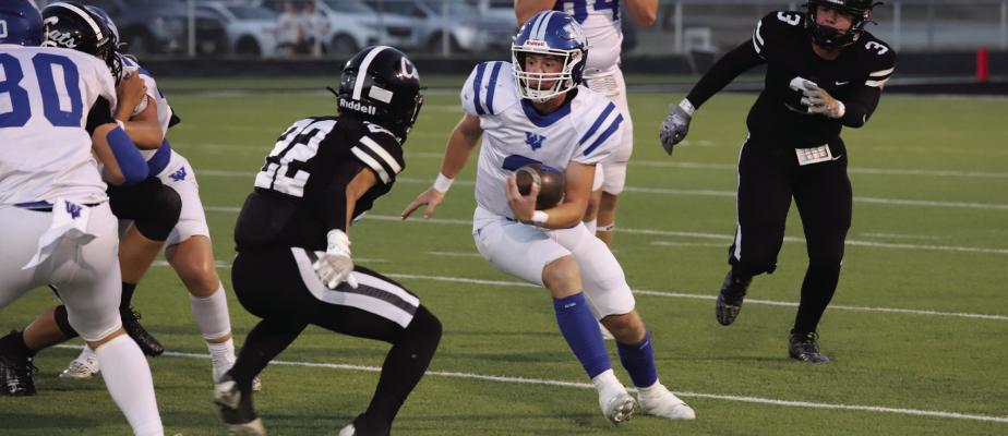 Trojan quarterback Brock Belcher will look to notch his third-straight win over the Archer City Wildcats on Friday, Oct. 10 for the upcoming 25-26 football season.