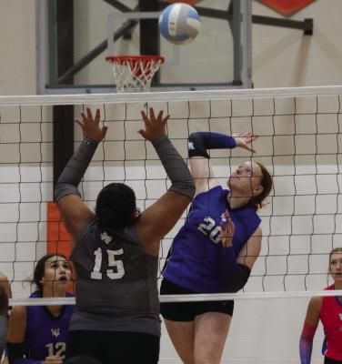Outside hitter Charlee Wolf slams down a kill in the Nocona Tournament. Wolf earned all-tournament team after she posted 47 kills in the tournament. Photo/Landon Davis