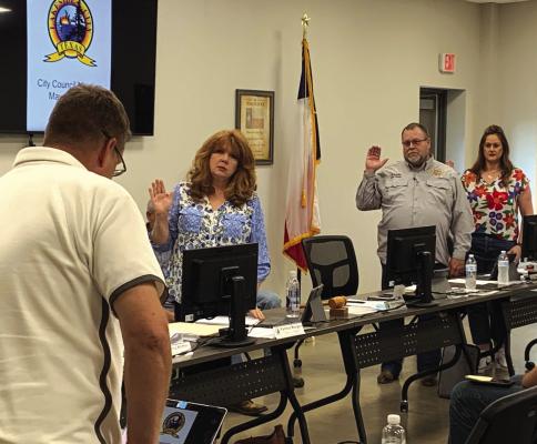 Lakeside City Council members Pamela Morgan (front), William Rutledge (middle) and Kim Williams (back) were sworn into another term on Tuesday, May 16. Photo/Nathan Lawson